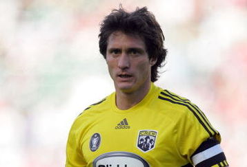 CARSON, CA - APRIL 05:  Guillermo Barros Schelotto #7 of the Columbus Crew walks to the corner to take a corner kick during the MLS match against Chivas USA at The Home Depot Center on April 5, 2009 in Carson, California. Chivas USA defeated the Crew 3-2.  (Photo by Victor Decolongon/Getty Images)