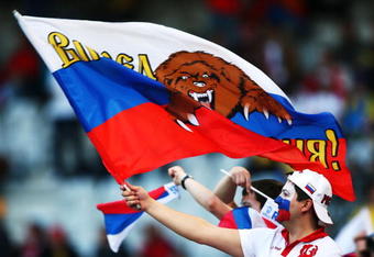 INNSBRUCK, AUSTRIA - JUNE 18:  A Russia fan waves a flag ahead of the UEFA EURO 2008 Group D match between Russia and Sweden at Stadion Tivoli Neu on June 18, 2008 in Innsbruck, Austria.  (Photo by Richard Heathcote/Getty Images)