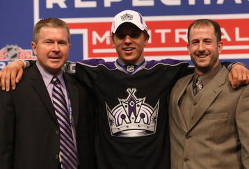 MONTREAL - JUNE 26:  Brayden Schenn poses with Los Angeles Kings Co-Directors of Amateur Scouting Michael Futa and Mark Yannetti after being drafted during the first round of the 2009 NHL Entry Draft at the Bell Centre on June 26, 2009 in Montreal, Quebec, Canada. (Photo by Bruce Bennett/Getty Images)
