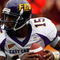 BLACKSBURG, VA - SEPTEMBER 01:  Quarterback Patrick Pinkney of the East Carolina Pirates rolls out of the pocket to pass in the third quarter against the Virginia Tech Hokies on September 1, 2007 at Lane Stadium in Blacksburg, Virginia. Virginia Tech won the game 17-7.  (Photo by Win McNamee/Getty Images)