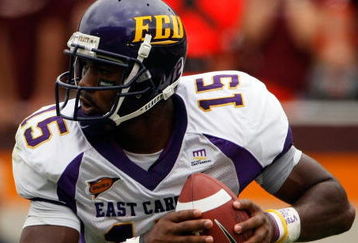 BLACKSBURG, VA - SEPTEMBER 01:  Quarterback Patrick Pinkney of the East Carolina Pirates rolls out of the pocket to pass in the third quarter against the Virginia Tech Hokies on September 1, 2007 at Lane Stadium in Blacksburg, Virginia. Virginia Tech won the game 17-7.  (Photo by Win McNamee/Getty Images)