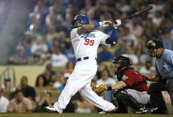 LOS ANGELES, CA - JULY 16:  Manny Ramirez #99 of the Los Angeles Dodgers at bat in the game against the Houston Astros on July 16, 2009 at Dodger Stadium in Los Angeles, California.  (Photo by Stephen Dunn/Getty Images)