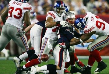 Nfl_g_tbradysack01_580_feature