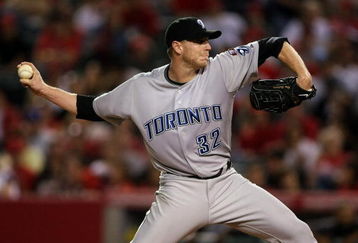 ANAHEIM, CA - MAY 6:  Roy Halladay #32 of the Toronto Blue Jays throws a pitch against the Los Angeles Angels of Anaheim at Angel Stadium May 6, 2009 in Anaheim, California.  (Photo by Stephen Dunn/Getty Images)