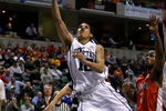 INDIANAPOLIS - MARCH 13:  Talor Battle #12 of the Penn State Nittany Lions drives for a shot attempt against the Illinois Fighting Illini during the Big Ten Men's Basketball Tournament at Conseco Fieldhouse on March 13, 2008 in Indianapolis, Indiana. Illionis won 64-63. (Photo by Jonathan Daniel/Getty Images)