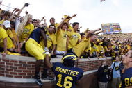 ANN ARBOR, MI - SEPTEMBER 27: Michael Shaw #20 and Roy Roundtree #16 of the Michigan Wolverines celebrate with fans following the game against the Wisconsin Badgers on September 27, 2008 at Michigan Stadium in Ann Arbor, Michigan. (Photo by Gregory Shamus/Getty Images)