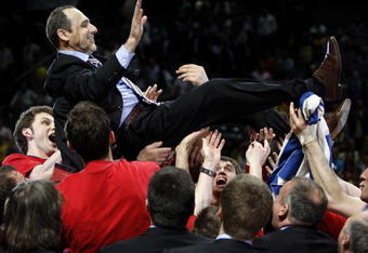 MADRID, SPAIN - MAY 04:  Head Coach Ettore Messina of CSKA Moscow is hoisted up by his players as they celebrate victory at the end of the Euroleague Final Four final basketball match between Maccabi Elite and CSKA Moscow, at the Palacio de Deportes on May 4, 2008 in Madrid, Spain. CSKA Moscow won the final 91-71.  (Photo by Jasper Juinen/Getty Images)