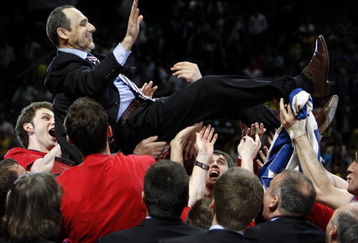MADRID, SPAIN - MAY 04:  Head Coach Ettore Messina of CSKA Moscow is hoisted up by his players as they celebrate victory at the end of the Euroleague Final Four final basketball match between Maccabi Elite and CSKA Moscow, at the Palacio de Deportes on May 4, 2008 in Madrid, Spain. CSKA Moscow won the final 91-71.  (Photo by Jasper Juinen/Getty Images)
