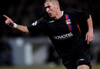 LYON, FRANCE - FEBRUARY 20:  Karim Benzema of Lyon celebrates after scoring during the UEFA Champions League first knockout round, first leg match between Lyon and Manchester United at the Stade Gerland on February 20, 2008 in Lyon, France.  (Photo by Shaun Botterill/Getty Images)