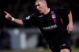 LYON, FRANCE - FEBRUARY 20:  Karim Benzema of Lyon celebrates after scoring during the UEFA Champions League first knockout round, first leg match between Lyon and Manchester United at the Stade Gerland on February 20, 2008 in Lyon, France.  (Photo by Shaun Botterill/Getty Images)