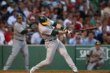 BOSTON - JULY 6: Nomar Garciaparra #1 of the Oakland Athletics hits an RBI single against the Boston Red Sox on July 6, 2009 in Boston, Massachusetts. (Photo by Elsa/Getty Images)