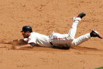 SAN FRANCISCO - MAY 25:  Travis Ishikawa #10 of the San Francisco Giants slides safely past Kelly Johnson #2 of the Atlanta Braves to steal second base in the fifth inning of their game at AT&T Park on May 25, 2009 in San Francisco, California.  (Photo by Ezra Shaw/Getty Images)