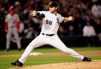 CHICAGO - OCTOBER 12:  Starting pitcher, Mark Buerhrle #56 of the Chicago White Sox delivers a pitch in the first inning against Los Angeles Angels of Anaheim during Game Two of the American League Championship Series on October 12, 2005 at U.S. Cellular Field in Chicago, Illinois.  The Angels lead the series 1-0.  (Photo by Jed Jacobsohn/Getty Images)