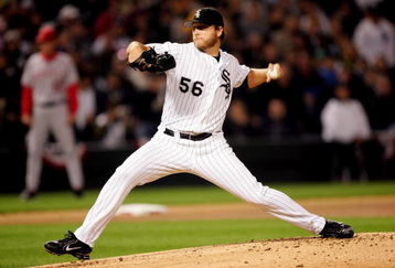 CHICAGO - OCTOBER 12:  Starting pitcher, Mark Buerhrle #56 of the Chicago White Sox delivers a pitch in the first inning against Los Angeles Angels of Anaheim during Game Two of the American League Championship Series on October 12, 2005 at U.S. Cellular Field in Chicago, Illinois.  The Angels lead the series 1-0.  (Photo by Jed Jacobsohn/Getty Images)