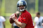 RENTON, WA - JUNE 12:  Quarterback Mike Teel #14 of the Seattle Seahawks drops back to pass during minicamp at the Seahawks training facility on June 12, 2009 in Renton, Washington. (Photo by Otto Greule Jr/Getty Images)