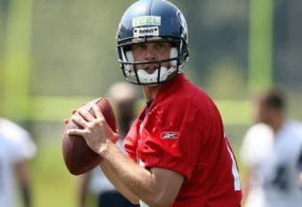 RENTON, WA - JUNE 12:  Quarterback Mike Teel #14 of the Seattle Seahawks drops back to pass during minicamp at the Seahawks training facility on June 12, 2009 in Renton, Washington. (Photo by Otto Greule Jr/Getty Images)