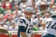 FOXBORO, MA - SEPTEMBER 7: Quarterback Tom Brady #12 of the New England Patriots passes the ball up the middle during their NFL game against the Kansas City Chiefs on September 7, 2008 at Gillette Stadium in Foxboro, Massachusetts. The Patriots defeated the Chiefs 17-10. (Photo by Elsa Garrison/Getty Images)