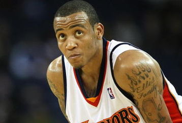 OAKLAND, CA - MARCH 30:  Monta Ellis #8 of the Golden State Warriors looks on against the Memphis Grizzlies during an NBA game on March 30, 2009 at Oracle Arena in Oakland, California. NOTE TO USER: User expressly acknowledges and agrees that, by downloading and or using this photograph, User is consenting to the terms and conditions of the Getty Images License Agreement.  (Photo by Jed Jacobsohn/Getty Images)