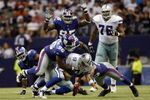 IRVING, TX - SEPTEMBER 9:  Quarterback Tony Romo #9 of the Dallas Cowboys gets sacked by Barry Cofield #96 of the New York Giants during the NFL game on September 9, 2007 at Texas Stadium in Irving, Texas.  (Photo by Layne Murdoch/Getty Images).  