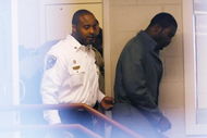 Sussex, VA - NOVEMBER 25:  Suspended Atlanta Falcons quarterback Michael Vick (R) leaves Surry County Circuit Court after entering a guilty plea on two felony counts connected to dog fighting on November 25, 2008 in Sussex, Virginia. Under a plea agreement, Vick, who is currently serving a term in prison for federal dog fighting charges, will serve one-year of probation for the state charges. He is scheduled to be released on July of 2009.  (Photo by Geoff Burke/Getty Images)