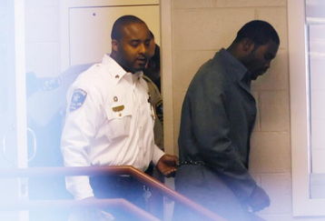 Sussex, VA - NOVEMBER 25:  Suspended Atlanta Falcons quarterback Michael Vick (R) leaves Surry County Circuit Court after entering a guilty plea on two felony counts connected to dog fighting on November 25, 2008 in Sussex, Virginia. Under a plea agreement, Vick, who is currently serving a term in prison for federal dog fighting charges, will serve one-year of probation for the state charges. He is scheduled to be released on July of 2009.  (Photo by Geoff Burke/Getty Images)