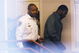 Sussex, VA - NOVEMBER 25:  Suspended Atlanta Falcons quarterback Michael Vick (R) leaves Surry County Circuit Court after entering a guilty plea on two felony counts connected to dog fighting on November 25, 2008 in Sussex, Virginia. Under a plea agreement, Vick, who is currently serving a term in prison for federal dog fighting charges, will serve one-year of probation for the state charges. He is scheduled to be released on July of 2009.  (Photo by Geoff Burke/Getty Images)