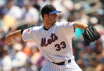 NEW YORK - MAY 31:  John Maine #33 of the New York Mets pitches against  the Florida Marlins during their game on May 31, 2009 at Citi Field in the Flushing neighborhood of the Queens borough of New York City.  (Photo by Al Bello/Getty Images)