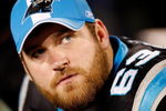 CHARLOTTE, NC - JANUARY 10:  Geoff Hangartner #63 of the Carolina Panthers looks on from the bench during the game against the Arizona Cardinals during the NFC Divisional Playoff Game on January 10, 2009 at Bank of America Stadium in Charlotte, North Carolina.  (Photo by Streeter Lecka/Getty Images)