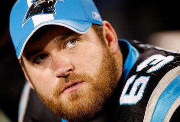 CHARLOTTE, NC - JANUARY 10:  Geoff Hangartner #63 of the Carolina Panthers looks on from the bench during the game against the Arizona Cardinals during the NFC Divisional Playoff Game on January 10, 2009 at Bank of America Stadium in Charlotte, North Carolina.  (Photo by Streeter Lecka/Getty Images)