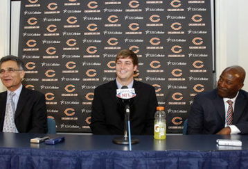 LAKE FOREST, IL - APRIL 3: General Manager Jerry Angelo (L) of the Chicago Bears looks on along with head coach Lovie Smith (R) as they introduce Jay Cutler as their new quarterback during a press conference on April 3, 2009 at Halas Hall in Lake Forest, Illinois. (Photo by Jim Prisching/Getty Images)