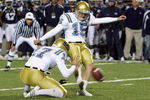LAS VEGAS - DECEMBER 22:  UCLA Bruins punter Aaron Perez #17 holds the ball as Kai Forbath #15 attempts to kick a field goal with three seconds left in the fourth quarter of the Pioneer Las Vegas Bowl December 22, 2007 in Las Vegas, Nevada. The Cougars blocked the kick and won the game 17-16.  (Photo by Ethan Miller/Getty Images)  