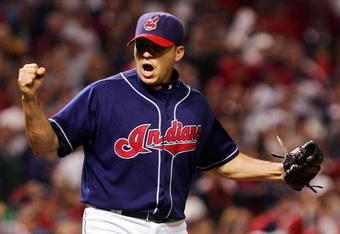 CLEVELAND - OCTOBER 16:  Rafael Betancourt #63 of the Cleveland Indians celebrates after closing the game to defeat the Boston Red Sox by a score of 7-3 to win Game Four of the American League Championship Series at Jacobs Field on October 16, 2007 in Cleveland, Ohio.  (Photo by Jim McIsaac/Getty Images)
