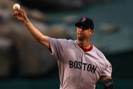 ANAHEIM, CA - MAY 13:  Pitcher Tim Wakefield #49 of the Boston Red Sox throws a pitch against the Los Angeles Angels of Anaheim on May 13, 2009 at Angel Stadium in Anaheim, California.   (Photo by Stephen Dunn/Getty Images)