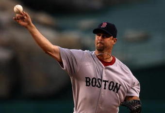 ANAHEIM, CA - MAY 13:  Pitcher Tim Wakefield #49 of the Boston Red Sox throws a pitch against the Los Angeles Angels of Anaheim on May 13, 2009 at Angel Stadium in Anaheim, California.   (Photo by Stephen Dunn/Getty Images)