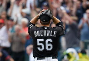 CHICAGO, IL - JULY 23: Pitcher Mark Buehrle #56 of the Chicago White Sox reacts in celebration after pitching a perfect game against the Tampa Bay Rays at U.S. Cellular Field on July 23, 2009 in Chicago, Illinois. The White Sox defeated the Rays 5-0, as Buehrle became the 18th pitcher in 132 years of major league baseball to throw a perfect game. (Photo by Scott Boehm/Getty Images)