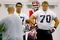 ORCHARD PARK, NY - MAY 01: Andy Levitre #67 and Eric Wood #70 of the Buffalo Bills listen to lineman coach Sean Kugler during Buffalo Bills Minicamp at Buffalo Bills Fieldhouse on May 1, 2009 in Orchard Park, New York.  (Photo by Rick Stewart/Getty Images)