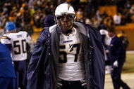 PITTSBURGH - JANUARY 11:  Matt Wilhelm #57 of the San Diego Chargers looks on dejected from the sideline the Pittsburgh Steelers during their AFC Divisional Playoff Game on January 11, 2009 at Heinz Field in Pittsburgh, Pennsylvania. Steelers won 35-24. (Photo by Chris Graythen/Getty Images)