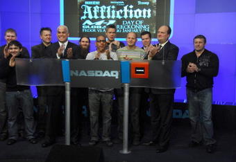 NEW YORK - JANUARY 20:  MMA fighter and former UFC light heavyweight champion Tito Ortiz, VP, Affliction Entertainment Tom Atencio, Fedor Vladimirovich Emelianenko, heavyweight mixed martial artist and current World Alliance of Mixed Martial Arts heavyweight champion and their guests ring the NASDAQ opening bell at NASDAQ in Times Square on January 20, 2009 in New York City.  (Photo by Joe Corrigan/Getty Images)