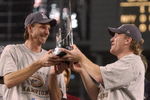 4 Nov 2001:  Co-MVP winners Randy Johnson #51 and Curt Schilling #38 of the Arizona Diamondbacks hold the trophys after game seven of the Major League Baseball World Series at Bank One Ballpark in Phoenix, Arizona. The Diamondbacks won 3-2 to capture the World Series title. DIGITAL IMAGE. Mandatory Credit: Harry How/ALLSPORT