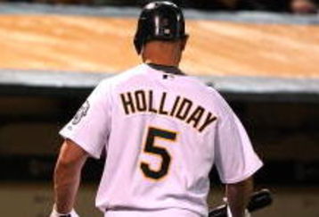 OAKLAND, CA - MAY 04:  Matt Holliday #5 of the Oakland Athletics walks back to the dugout after fouling out against the Los Angeles Angels of Anaheim in the sixth inning during a Major League Baseball game on May 4, 2009 at the Oakland Coliseum in Oakland, California.  (Photo by Jed Jacobsohn/Getty Images)