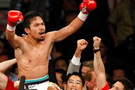 LAS VEGAS - MAY 02: Manny Pacquiao of the Philippines celebrates after knocking out Ricky Hatton of England in the second round of their junior welterweight title fight at the MGM Grand Garden Arena May 2, 2009 in Las Vegas, Nevada. (Photo by Ethan Miller/Getty Images)
