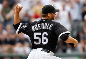 CHICAGO, IL - JULY 23: Pitcher Mark Buehrle #56 of the Chicago White Sox pitches in the 9th inning as he pitches a perfect game against the Tampa Bay Rays at U.S. Cellular Field on July 23, 2009 in Chicago, Illinois. The White Sox defeated the Rays 5-0, as Buehrle became the 18th pitcher in 132 years of major league baseball to throw a perfect game. (Photo by Scott Boehm/Getty Images)