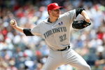 NEW YORK - JULY 04:  Roy Halladay #32 of the Toronto Blue Jays pitches against the New York Yankees on July 4, 2009 at Yankee Stadium in the Bronx borough of New York City.  (Photo by Nick Laham/Getty Images)