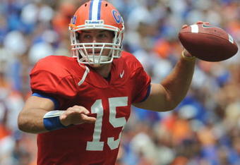 GAINESVILLE, FL - APRIL 18: Quarterback Tim Tebow #15 of the University of Florida passes upfield during the spring football Orange and Blue game April 18, 2009 at Ben Hill Griffin Stadium in Gainesville, Florida.  (Photo by Al Messerschmidt/Getty Images)