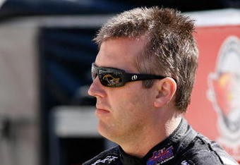BRISTOL, TN - MARCH 20:  Jeremy Mayfield driver of the #41 All Sport Body Quencher Toyota stands on pit road during qualifying for the NASCAR Sprint Cup Series Food City 500 at Bristol Motor Speedway on March 20, 2009 in Bristol, Tennessee.  (Photo by John Harrelson/Getty Images)