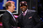NEW YORK - APRIL 25:  NFL Commissioner Roger Goodell poses with with San Francisco 49ers #10 draft pick Michael Crabtree at Radio City Music Hall for the 2009 NFL Draft on April 25, 2009 in New York City  (Photo by Jeff Zelevansky/Getty Images)