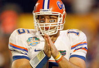MIAMI - JANUARY 08:  Quarterback Tim Tebow #15 of the Florida Gators reacts on the field against the Oklahoma Sooners during the FedEx BCS National Championship Game at Dolphin Stadium on January 8, 2009 in Miami, Florida.  (Photo by Eliot J. Schechter/Getty Images)