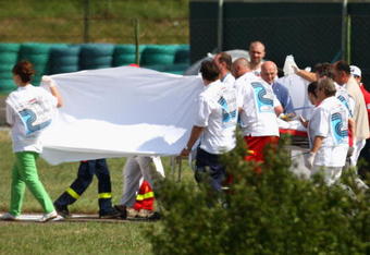 BUDAPEST, HUNGARY - JULY 25:  Felipe Massa of Brazil and Ferrari is airlifted by helicopter following his accident during qualifying for the Hungarian Formula One Grand Prix at the Hungaroring on July 25, 2009 in Budapest, Hungary.  (Photo by Ryan Pierse/Getty Images)