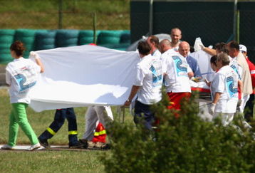 BUDAPEST, HUNGARY - JULY 25:  Felipe Massa of Brazil and Ferrari is airlifted by helicopter following his accident during qualifying for the Hungarian Formula One Grand Prix at the Hungaroring on July 25, 2009 in Budapest, Hungary.  (Photo by Ryan Pierse/Getty Images)
