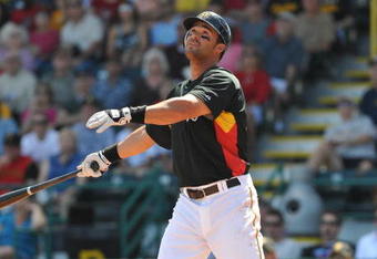 BRADENTON, FL - MARCH 8:  Infielder Garrett Jones #69 of the Pittsburgh Pirates follows a fly ball against the Houston Astros March 8, 2009 at McKechnie Field in Bradenton, Florida.  (Photo by Al Messerschmidt/Getty Images)